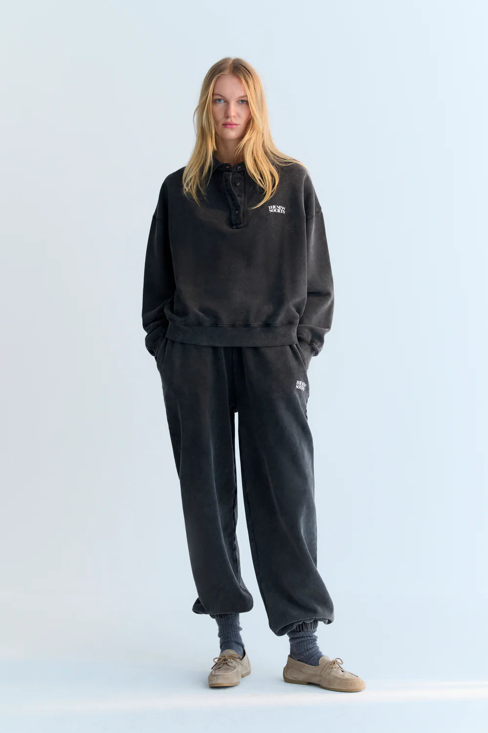 The New Society TNS Logo Collection Woman Jogging